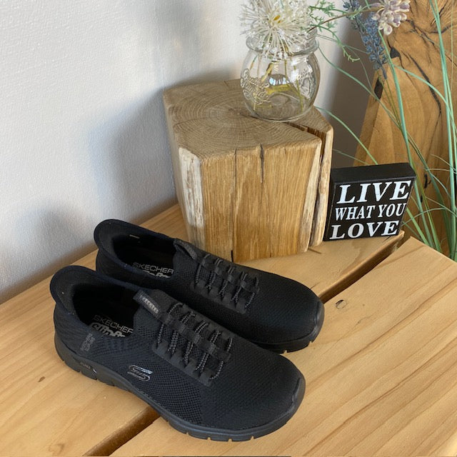 Sorte Skechers slip-ins med svangstøtte