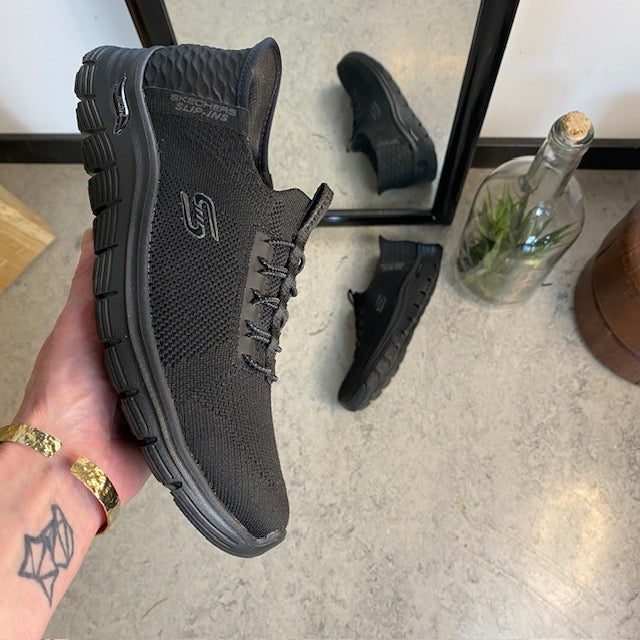 Sorte Skechers slip-ins med svangstøtte