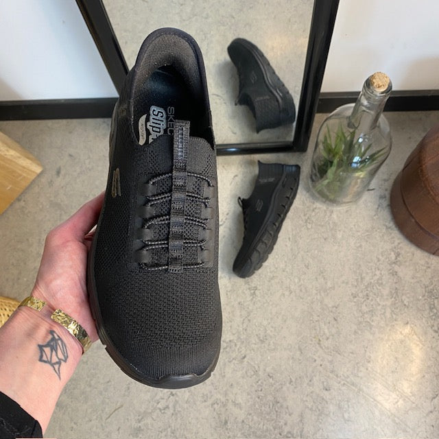Sorte Skechers slip-ins med svangstøtte