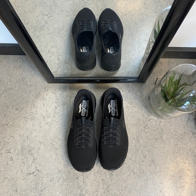 Sorte Skechers slip-ins med svangstøtte