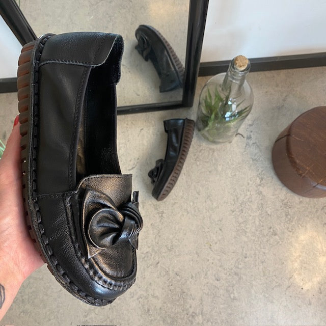 Elegant ballerina i sort skinn