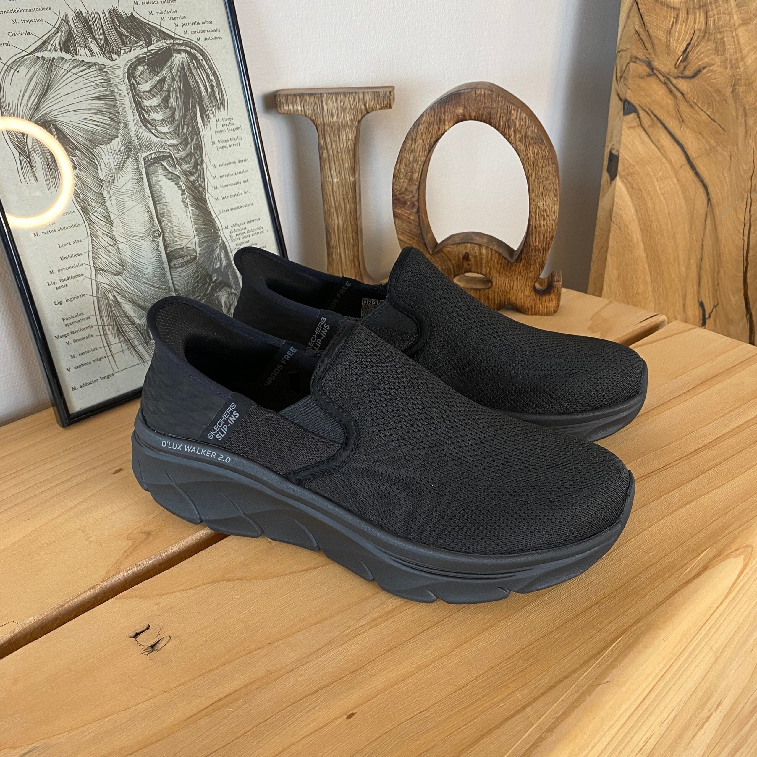 Svart herre slip-on-sko fra Skechers