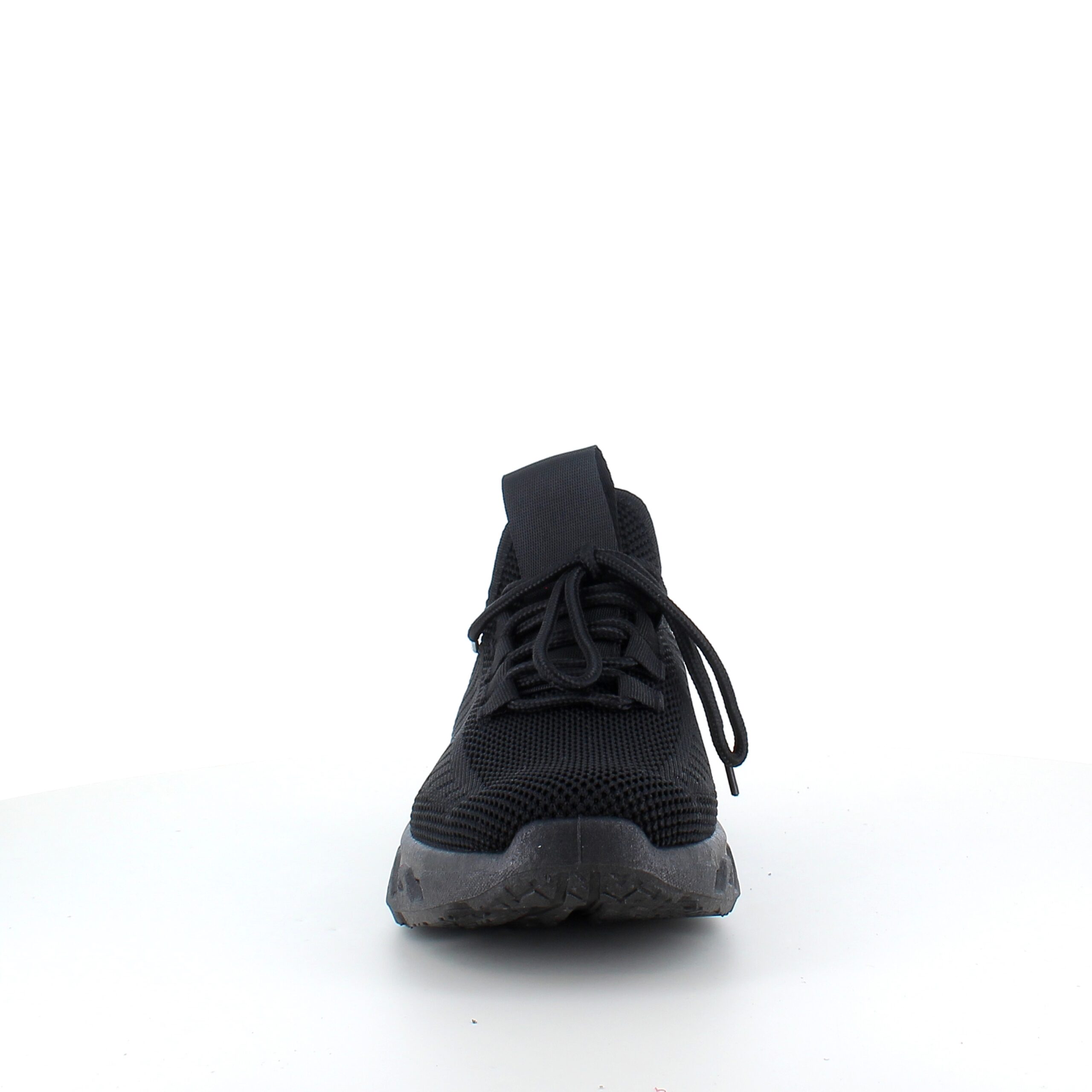 Sorte slip-on-sko med strikket overdel
