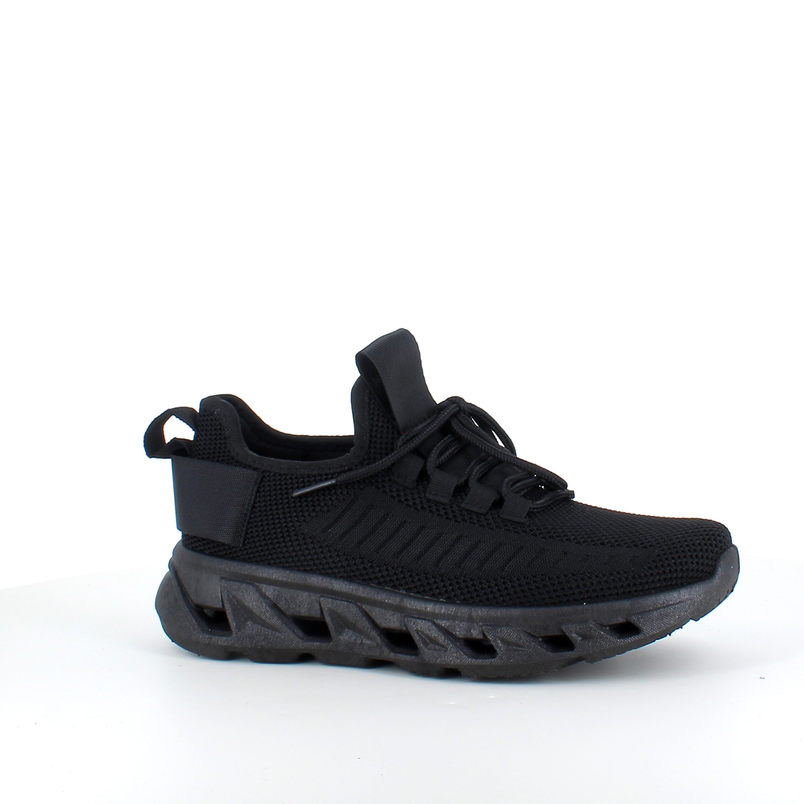 Sorte slip-on-sko med strikket overdel