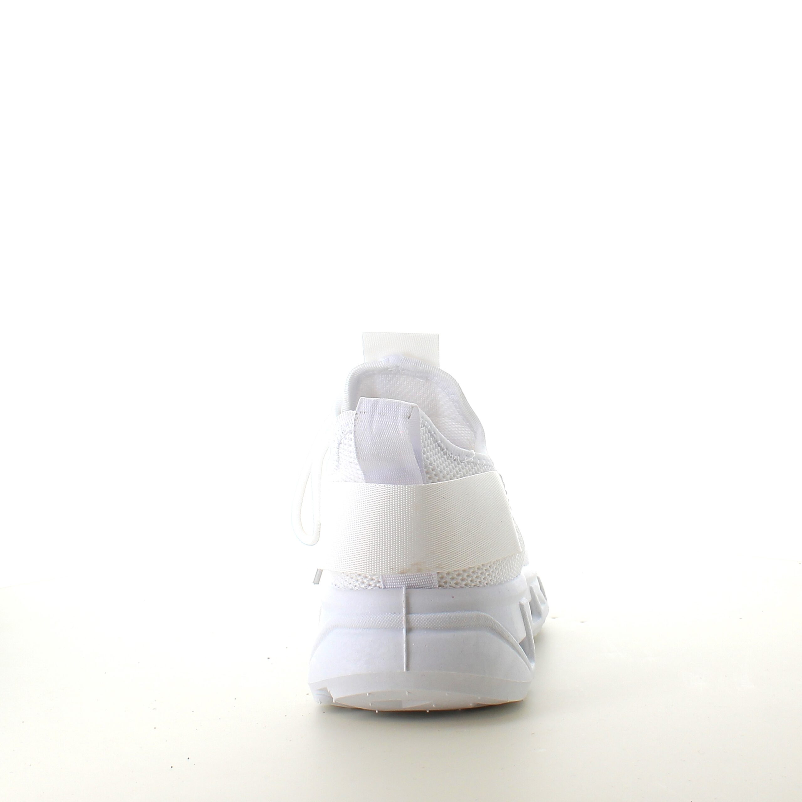 Hvite slip-on-sko med strikket overdel