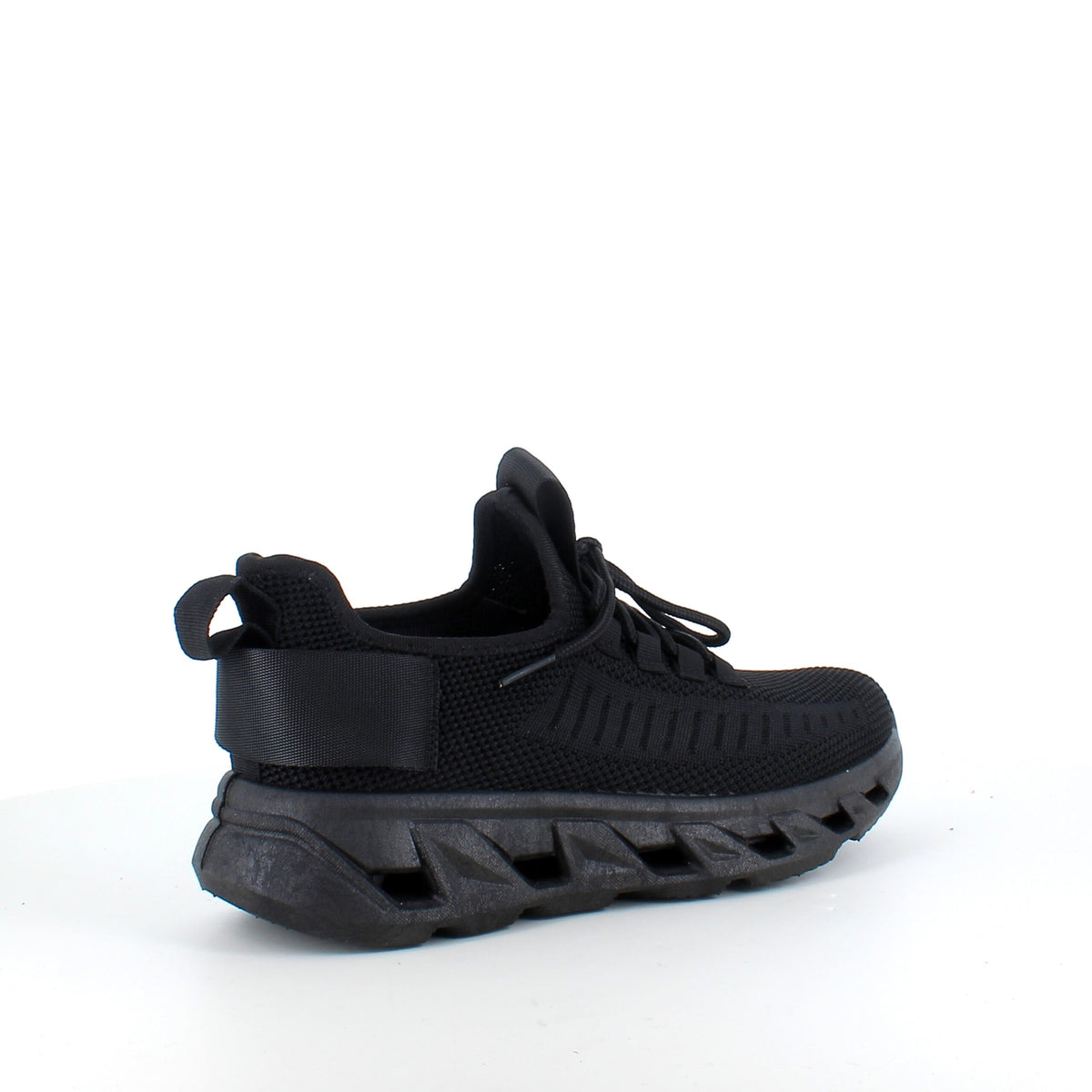 Sorte slip-on-sko med strikket overdel