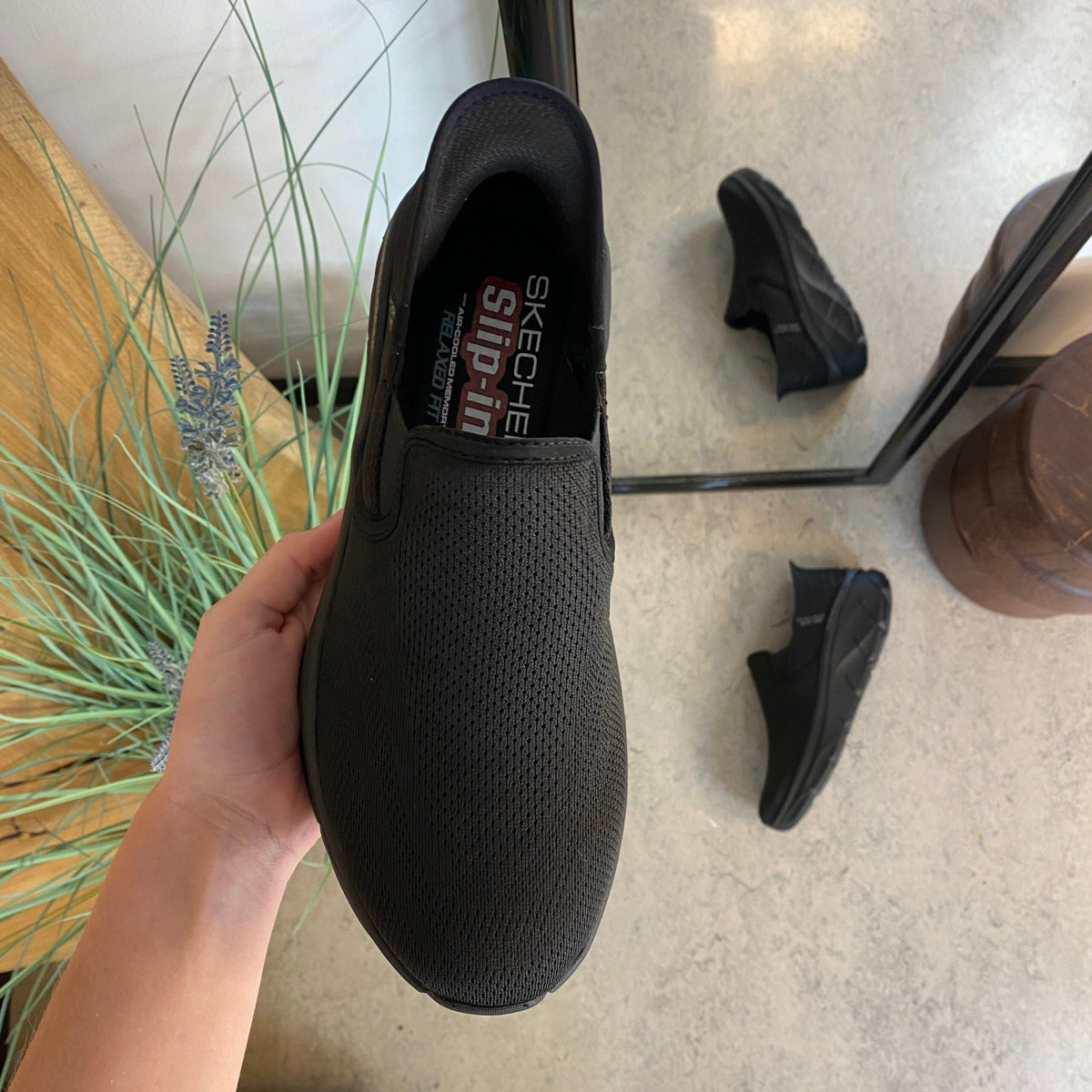 Svart herre slip-on-sko fra Skechers