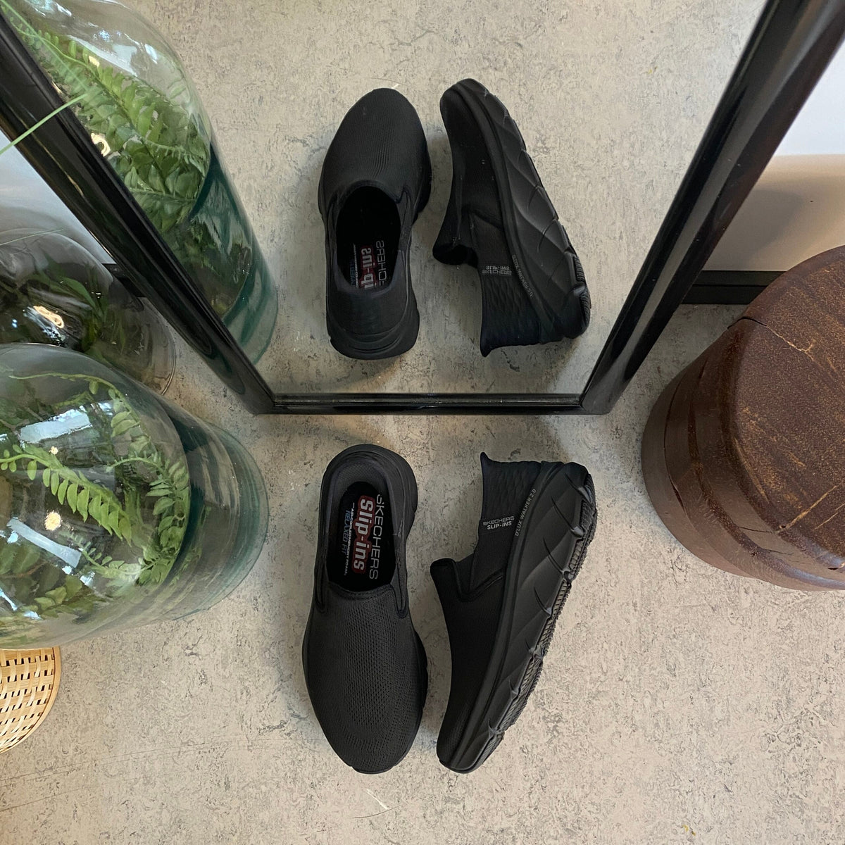 Svart herre slip-on-sko fra Skechers