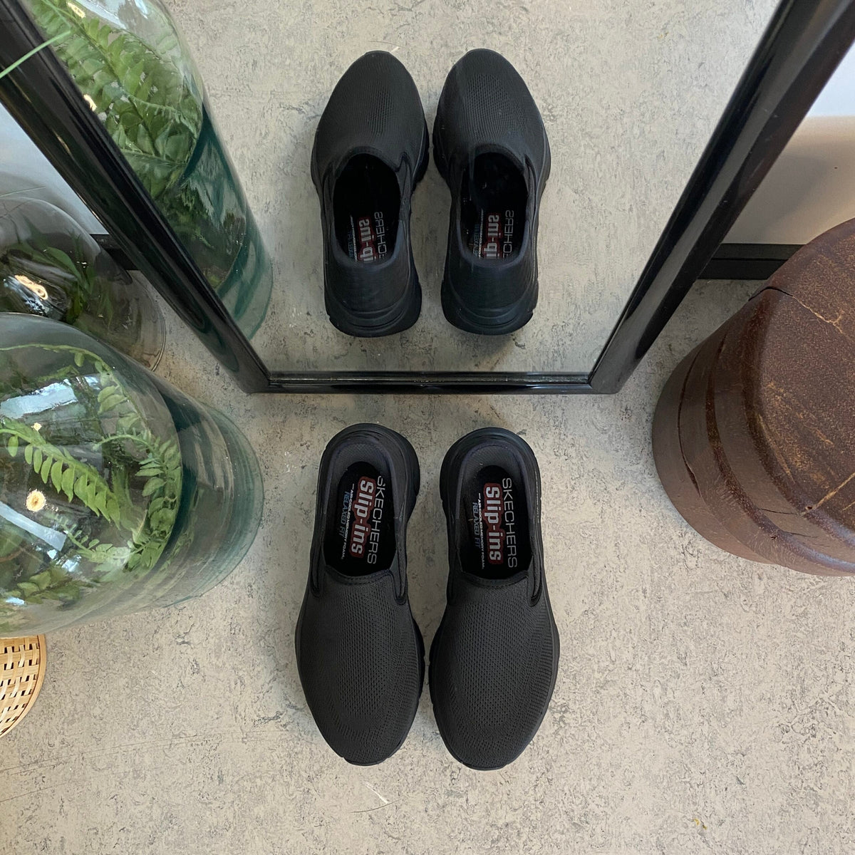 Svart herre slip-on-sko fra Skechers