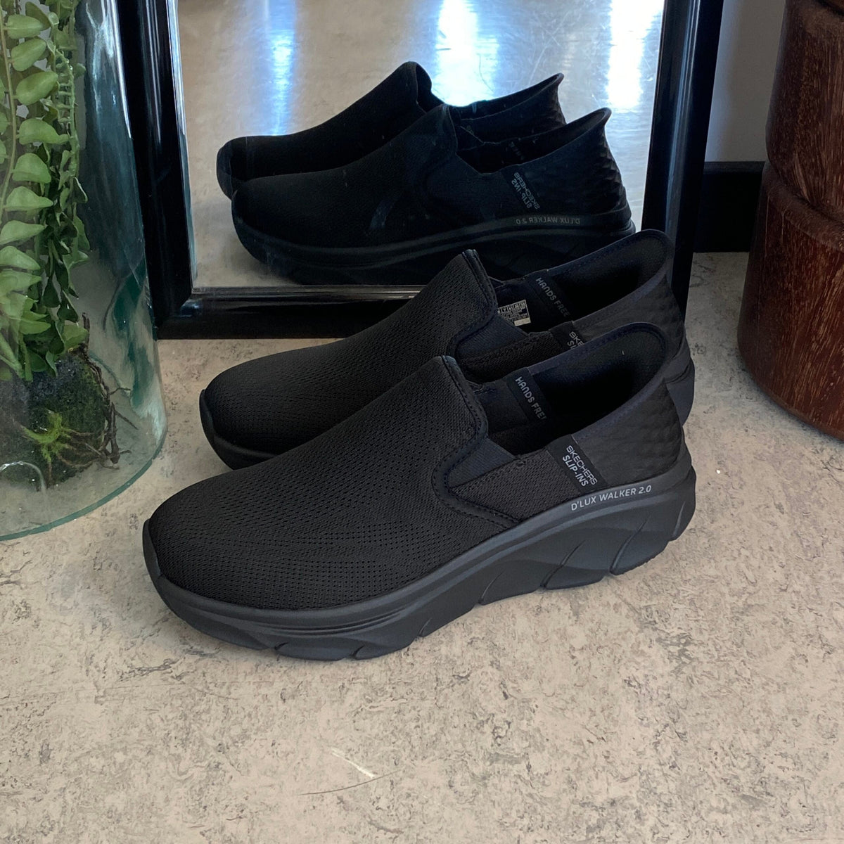 Svart herre slip-on-sko fra Skechers