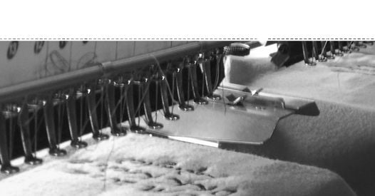 Logo broderi på klær