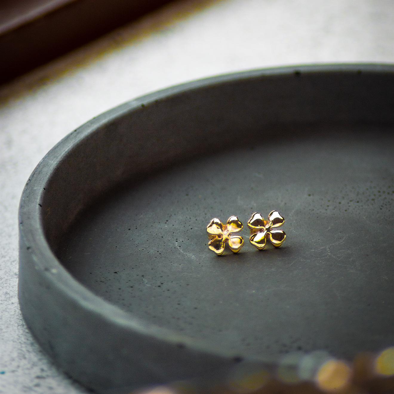 Firkløver ørestikker i gull