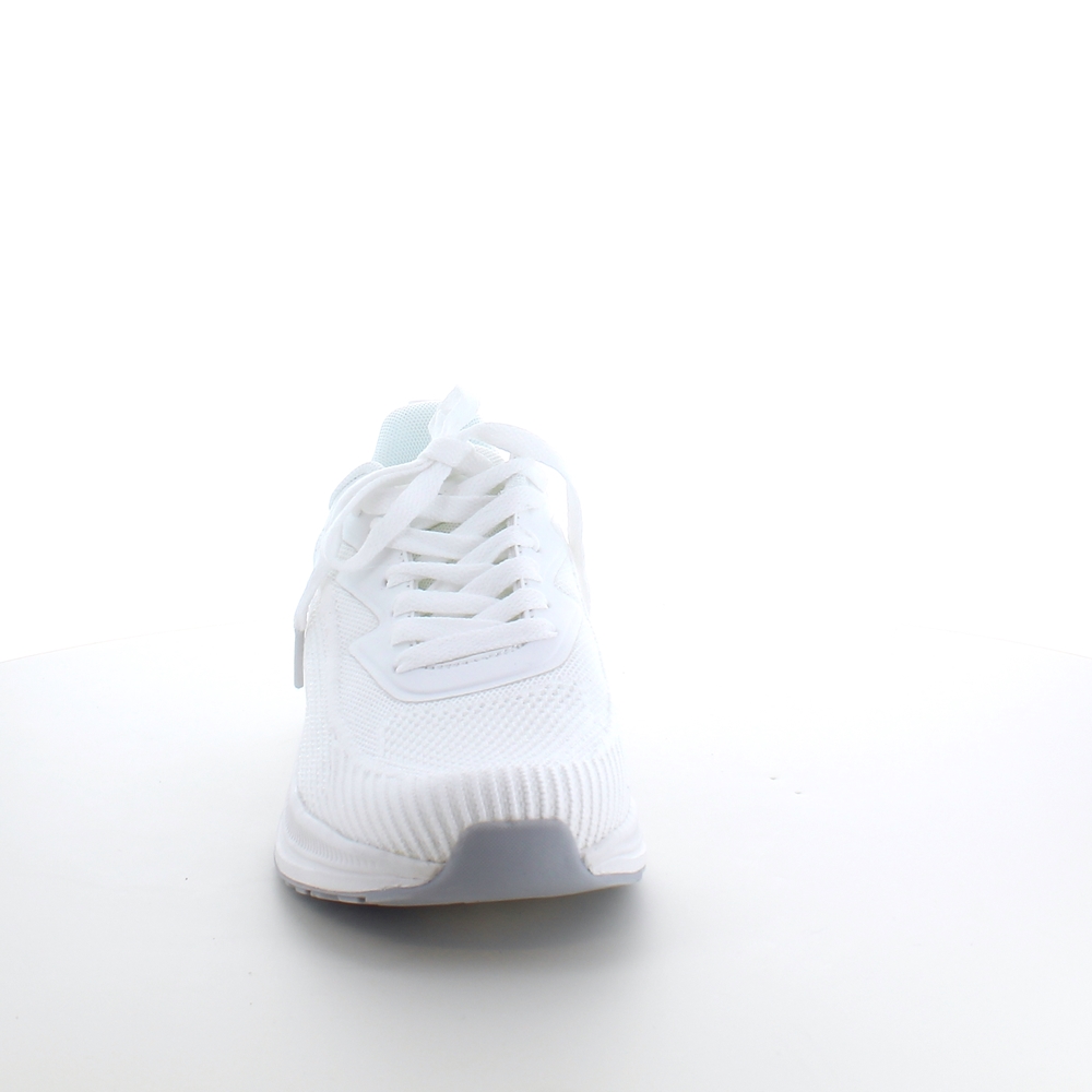 Hvit pustende sko fra Endurance med god støtdemping