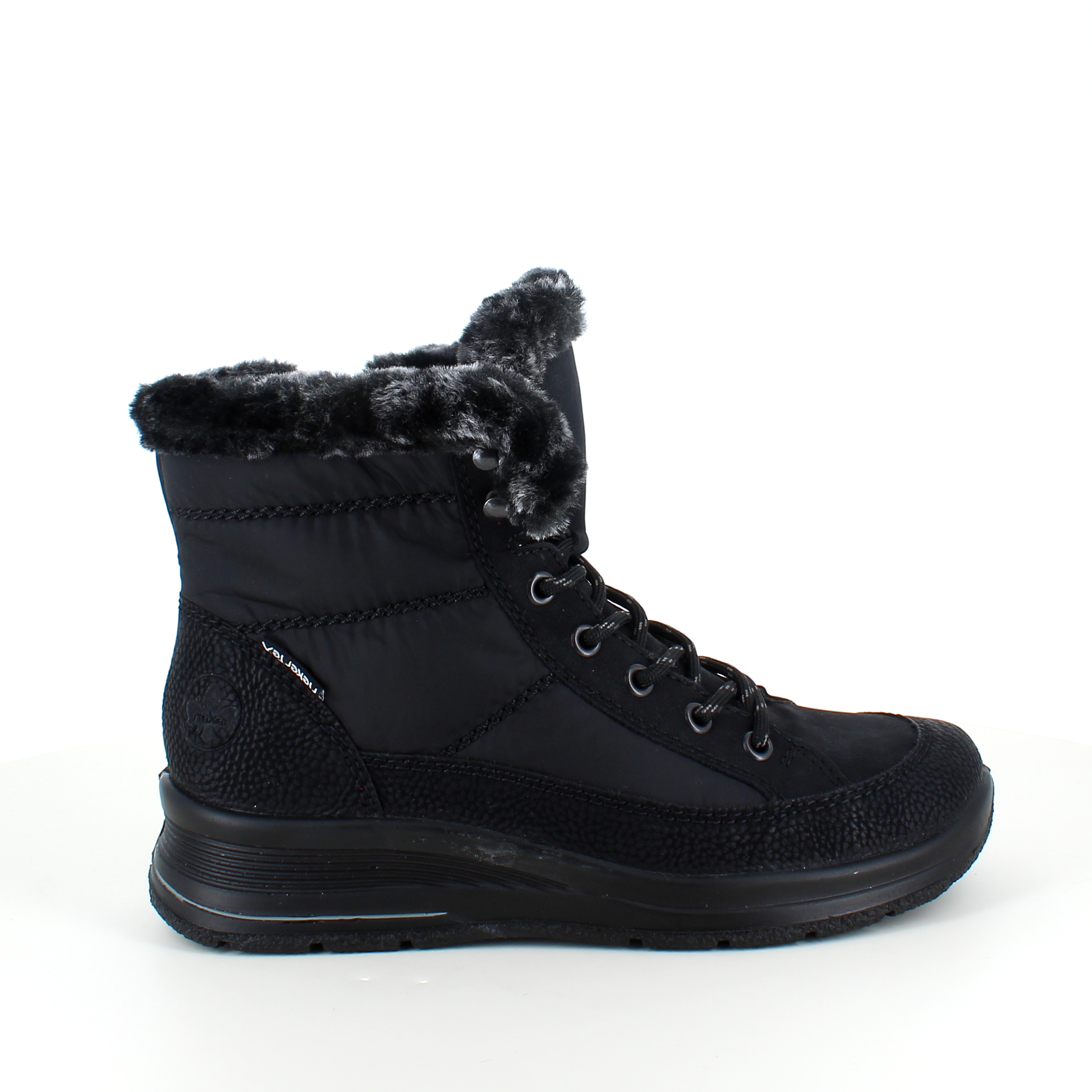 Varm vinterstøvel fra Rieker med imitert pelskant