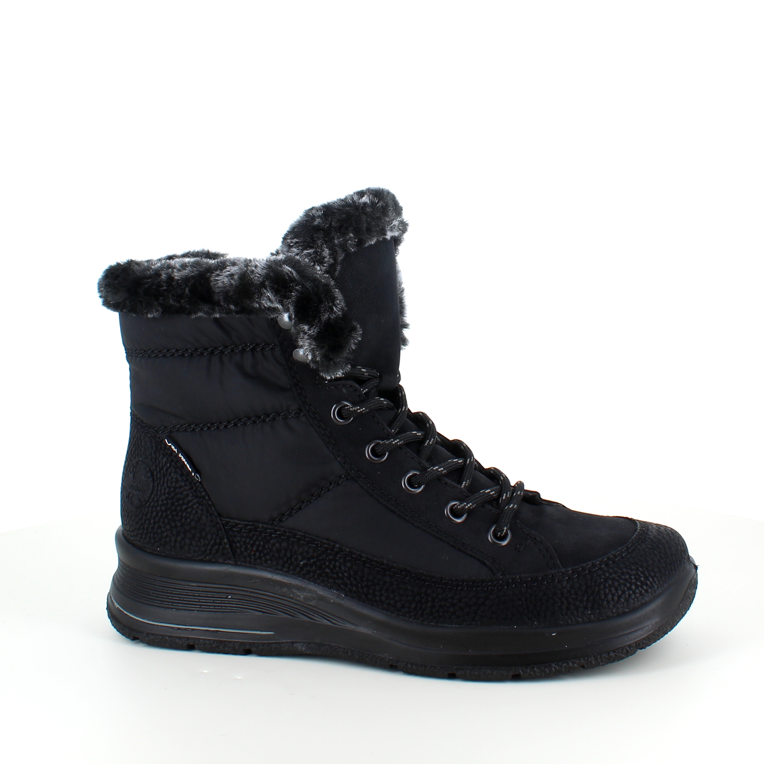 Varm vinterstøvel fra Rieker med imitert pelskant