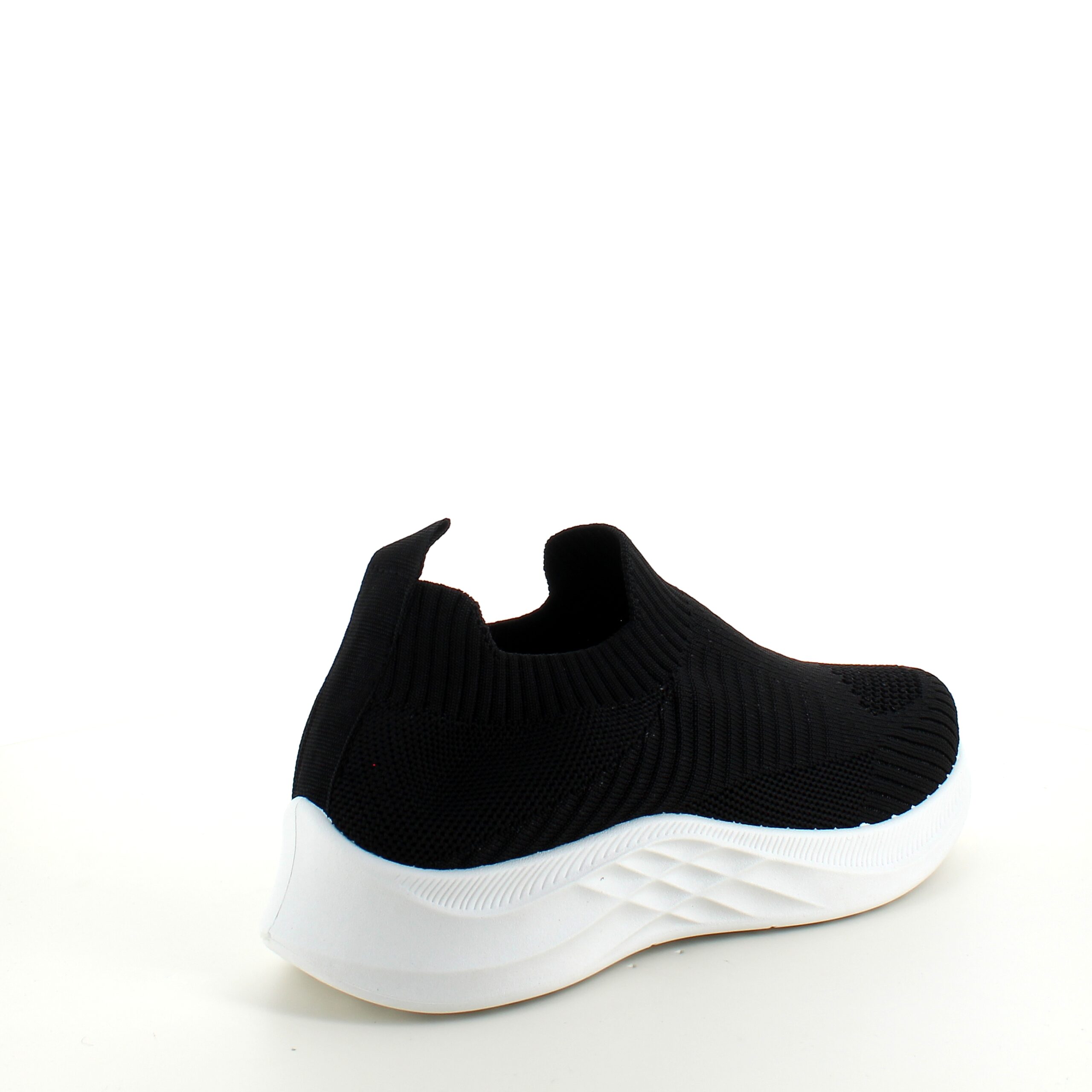 Svart slip-in sko med strikket overdel